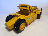 Caterpillar 615 Scraper 1:50 von NZG 260