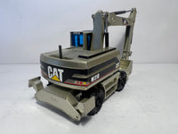 Caterpillar M 318 Mobilbagger mattgold 1:50 von NZG 405