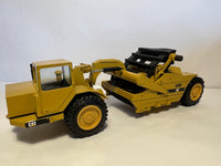 Caterpillar 615 Scraper 1:50 von NZG 260