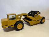 Caterpillar 615 Scraper 1:50 von NZG 260