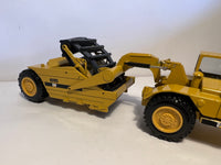 Caterpillar 615 Scraper 1:50 von NZG 260